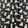 Tissu en coton - Pattes de chat et pelotes de laine sur fond noir