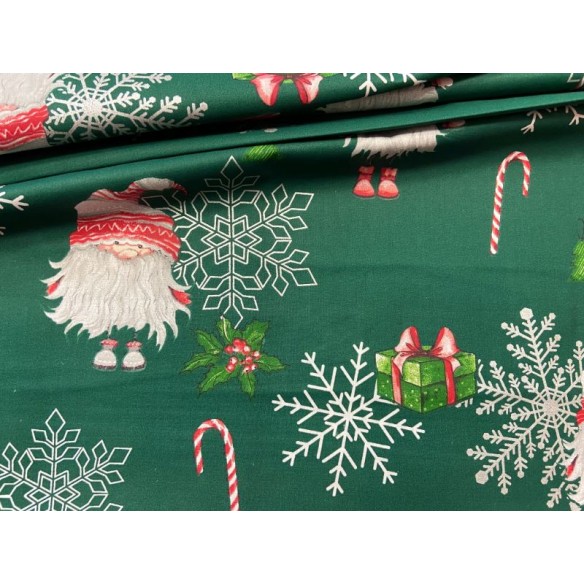 Tissu en coton - Festif Père Noël et flocons de neige sur vert