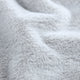Tissu en fourrure de lapin tricotée - noir