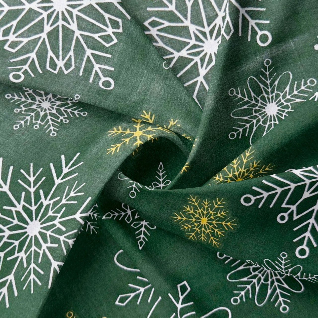 Cotton Fabric - White and gold snowflakes on green background