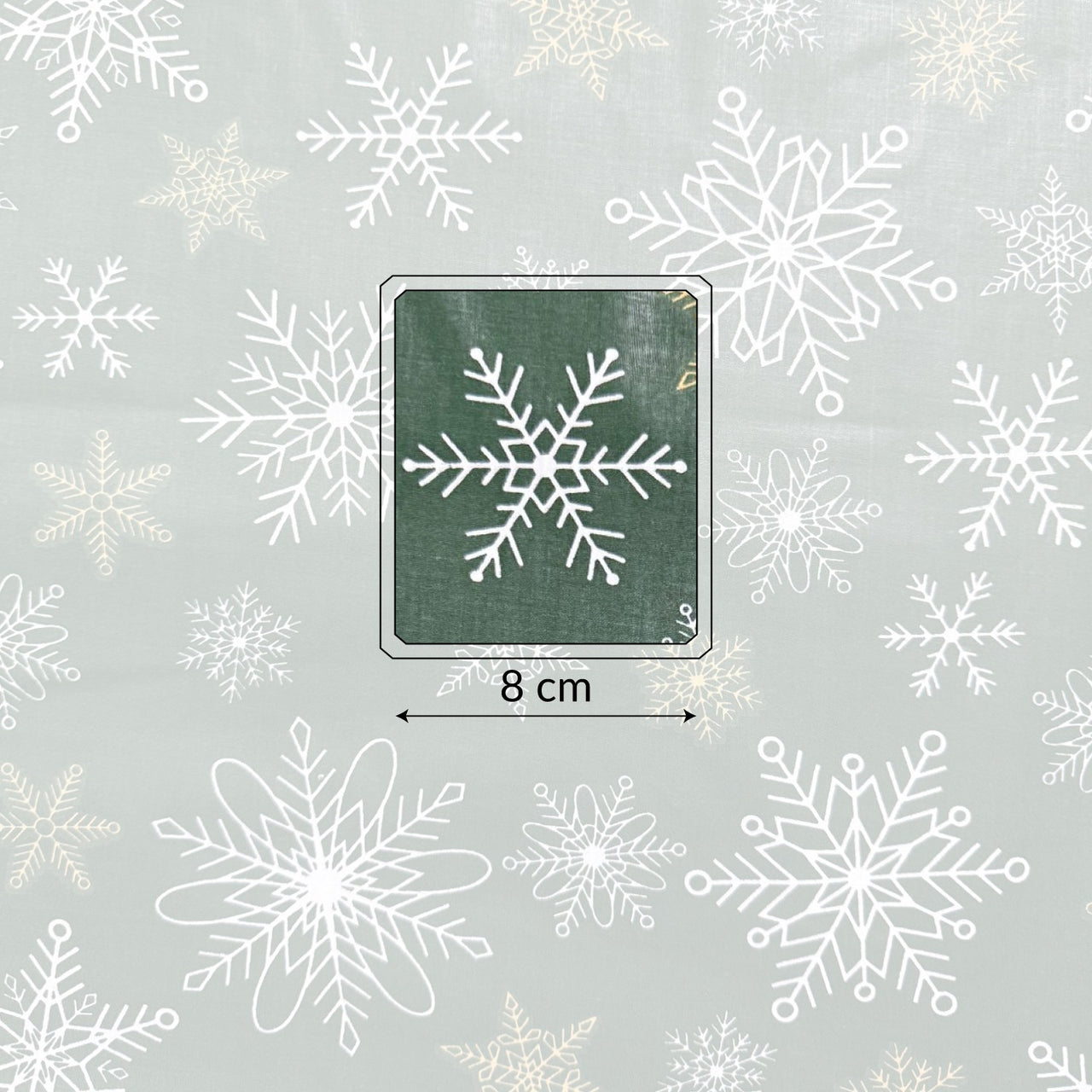 Cotton Fabric - White and gold snowflakes on green background